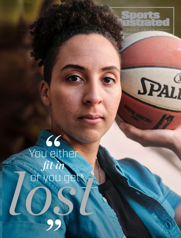Layshia Clarendon holding a basketball